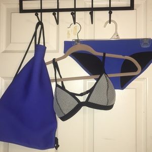 Triangl swimsuit set with bag included